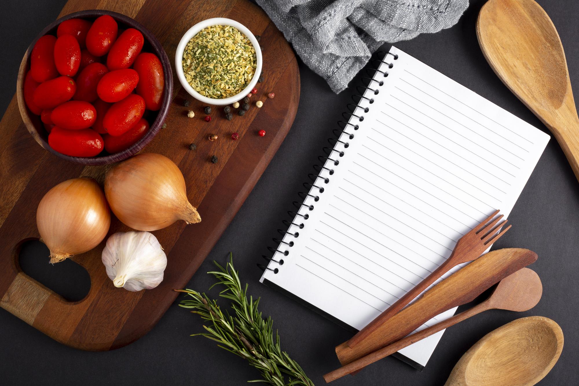 studio kitchen table with ingredients and notes